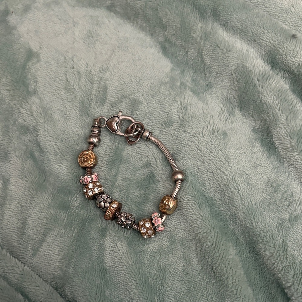 Elegant Silver and Gold Charm Bracelet